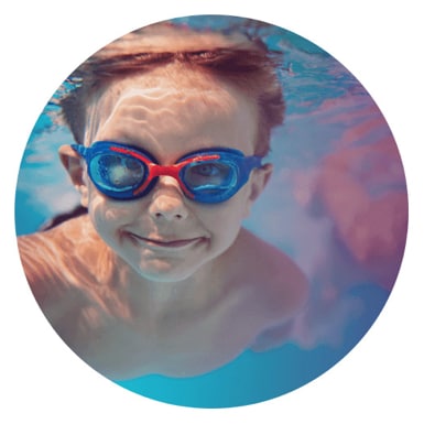 closeup of kids face swimming underwater